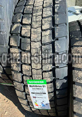 Goodride MultiDrive D1 (приводная) 315/70 R22.5 154/150L 20PR - Фото протектора с этикеткой на улице